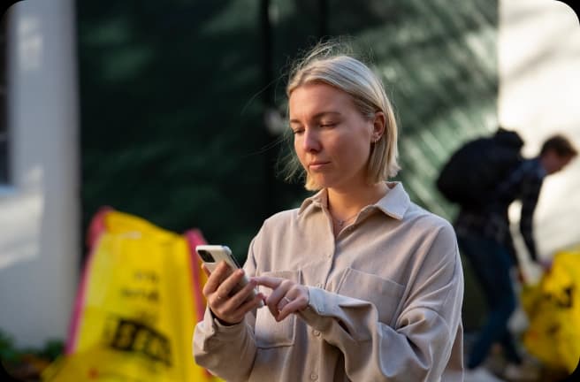 Person med telefon